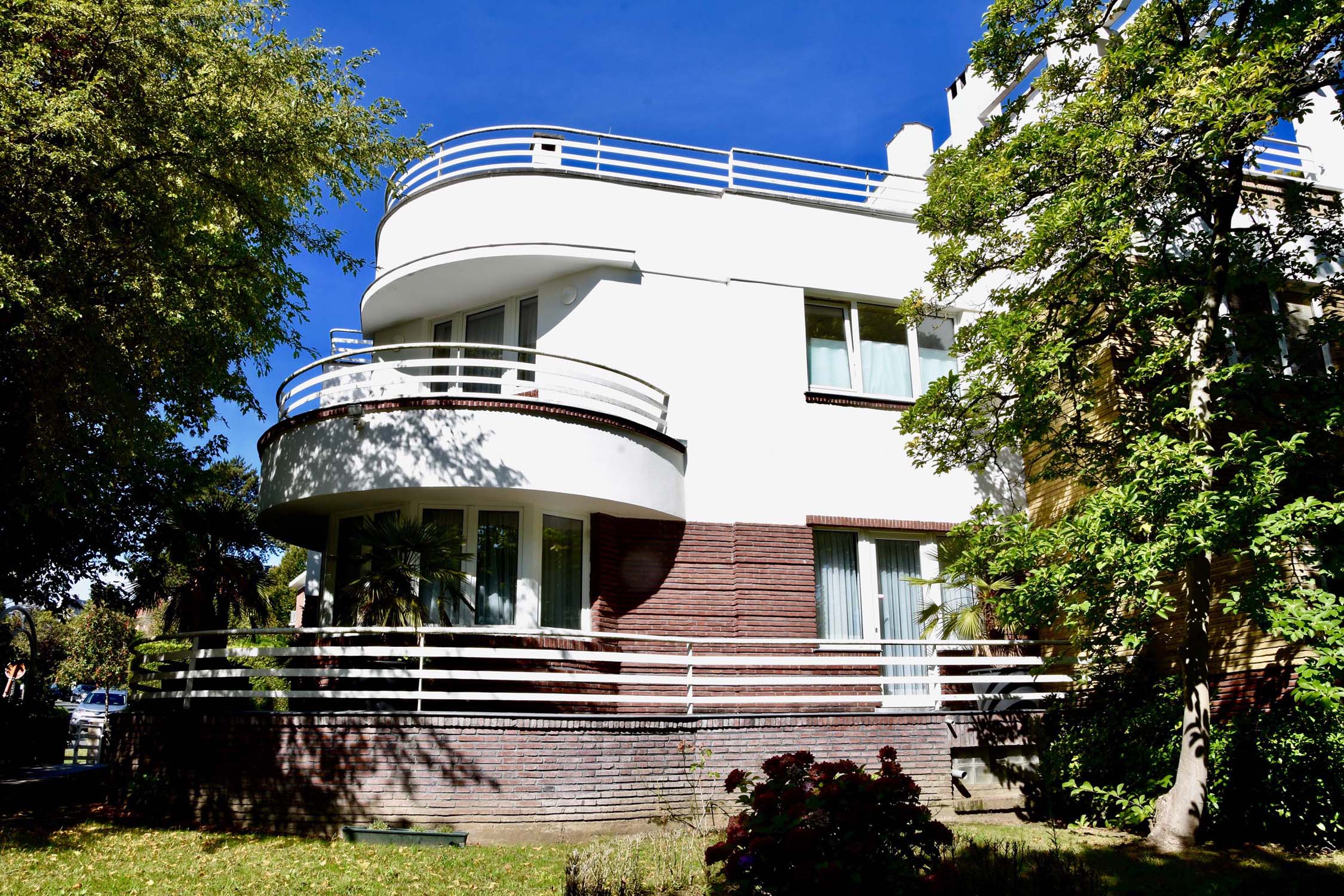 Two semi-detached Streamline style villas