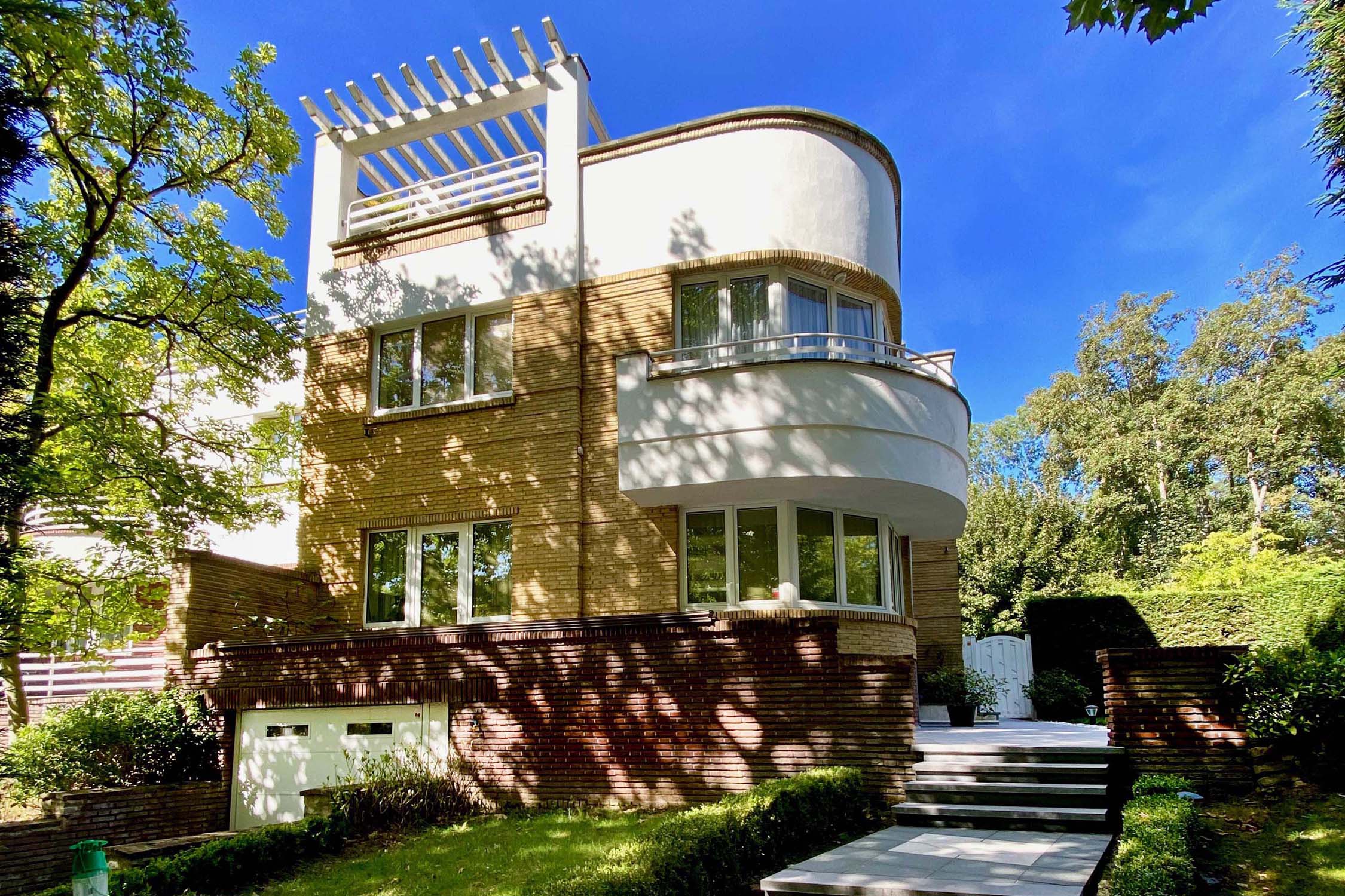 Two semi-detached "Streamline" villas