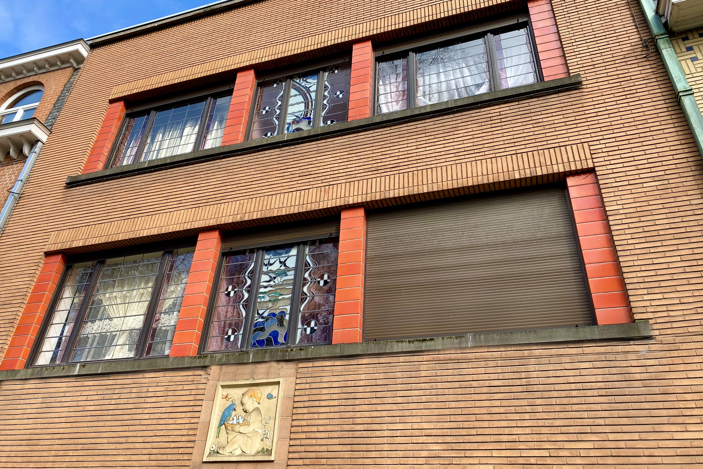 Modernist house with cherub